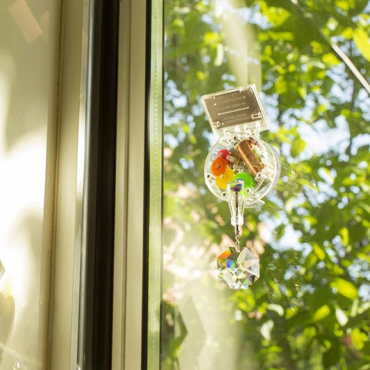 solar powered rainbow maker kikkerland david dear rainbows sun power window sunlight swarovski crystal revolves refracts light swirl enchanting