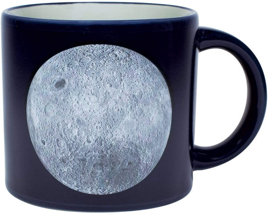 Here are two gorgeous Moon portraits-the "magnificent desolation" of the Near Side and the mysterious terrain of Far Side. When the mug is cold, you see the Moon(s) against a sea of black. Add a steaming beverage and watch the mug transform, revealing the names of Apollo missions, astronauts, landing sites, and milestones. 14 oz. ceramic mug. Comes in a colorful box. Color changing cups are microwave safe, but not dishwasher safe. Hand wash only. Don't soak.