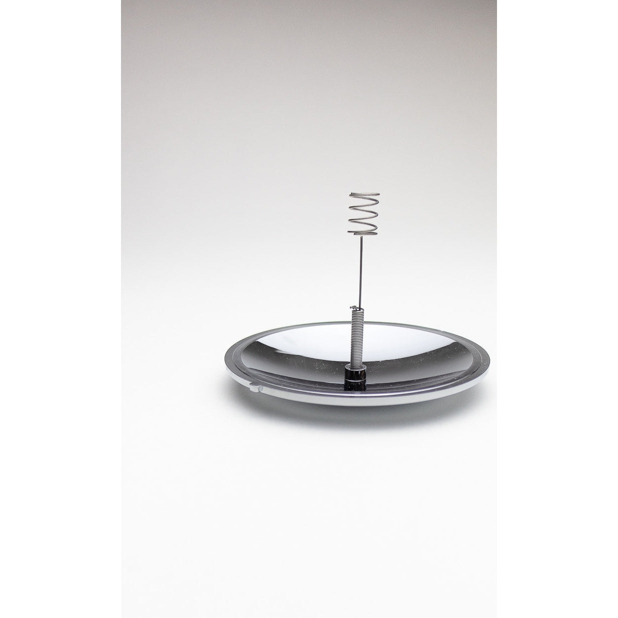 A simple but useful tool to keep on hand for lighting fires. Experiment at home, take it with you camping or keep it with you for emergencies.