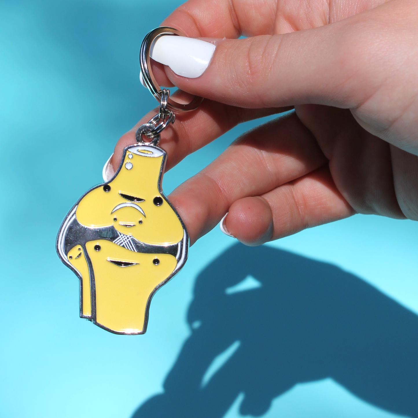 Knee enamel Keychain