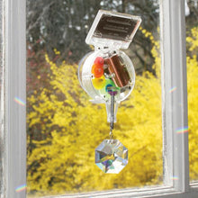 Load image into Gallery viewer, solar powered rainbow maker kikkerland david dear rainbows sun power window sunlight swarovski crystal revolves refracts light swirl enchanting
