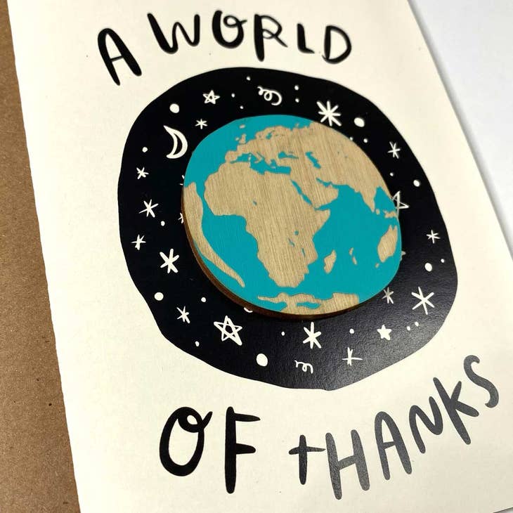 A thank-you card that is also a gift! A laser-engraved Earth magnet is affixed to the front of a greeting card and is meant to be removed and kept forever. The paper, envelope (and cellophane packaging) should all be recycled, because the world for sure doesn't need more trash. Magnet is made from handpainted 1/8" baltic birch plywood. Super strong rare earth magnet. A2 digitally printed greeting card (4.25" x 5.5"). Magnet measures approximately 2" x 2". 