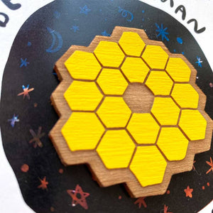 Being a human is weird, and the Webb telescope and the images it's sending back to Earth are a great reminder. The perfect card for the science buff in your life, or anyone who needs a little help putting things in perspective. Packaged in a cellophane sleeve with a kraft envelope. Magnet is hand painted 1/8" baltic birch plywood. Super strong rare earth magnet. Blank inside.