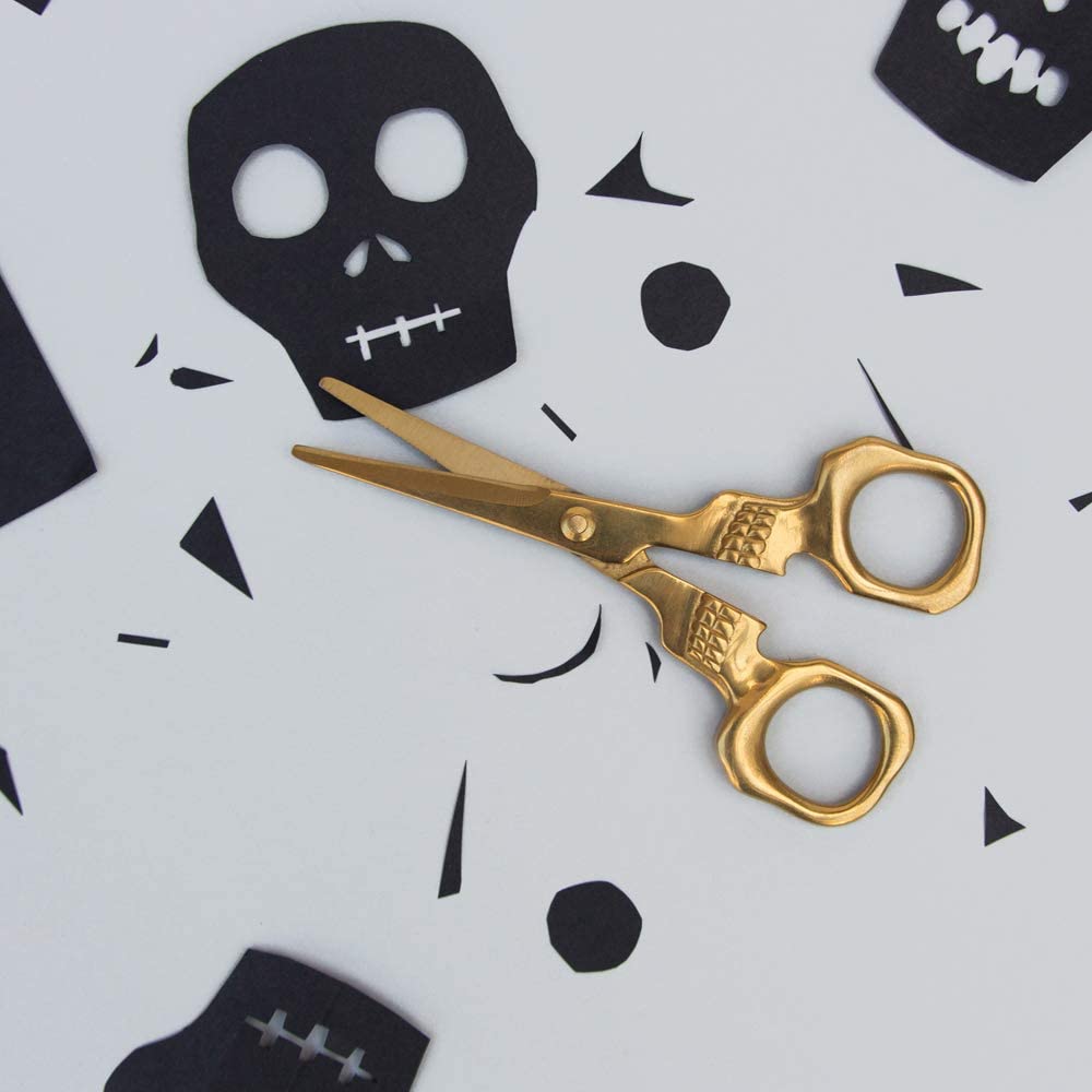 Quality stainless steel scissors with a brass finish, shaped in a cool skull design. Heavy duty for everyday use - These stylish scissors are multi-purpose for all your home or office needs Makes a great novelty gift, as a stocking filler or Secret Santa present at Christmas, or for birthdays, anniversaries and other special occasions A decorative twist to an essential workplace or house hold item, whether it's teachers taking them to The classroom at school/ college, students taking them to University