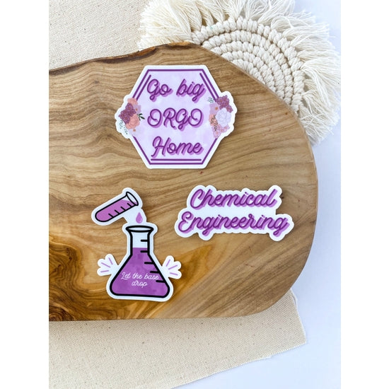 his sticker pack includes the chemical engineering sticker, the go big orgo home sticker, and the base drop sticker. These stickers are perfect for anyone who loves chemistry! They can be easily placed on laptops, iPads, journals, water bottles, and many other surfaces.
