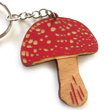Load image into Gallery viewer, Each keychain is made of handpainted laser-engraved baltic birch plywood and secured with a metal keyring.
