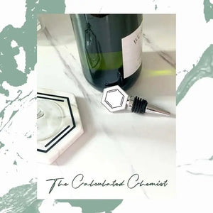 Who said wine connoisseurs can't also love aromatic molecules? With the Chemistry Wine Stopper, now you can make a scientific statement when hosting your next party! This charming kitchenware is designed like a hexagonal Benzene molecule, with its silver-plated finish sure to delight any science or chemistry professor - or geek - in your life