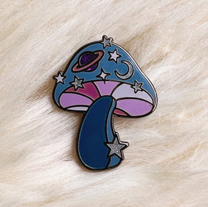 This cosmic mushroom enamel pin will launch you to a psychedelic galaxy! Magical blues & pink accents with sparkly embroidered moon & star details makes this the trippiest, cutest enamel pin!