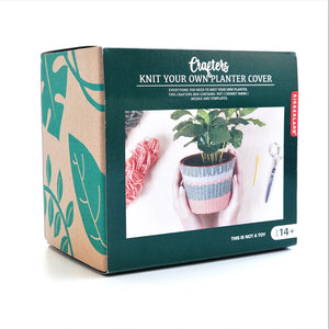 Cover your old plant pots with this knitting kit!  Perfect for anyone who loves to knit or to give as a gift  Kit comes with everything you need to knit your own planter!  This crafters box contains a pot, three different colors of chunky yarn, needle, and templates 