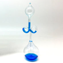 Load image into Gallery viewer, hand boiler tedco toys classic science toy base blue liquid boil glass vessel fragile charles&#39; law energy transfer accessory decor office teaching explain scientific term 7&quot; tall ages 14+ 
