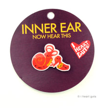 Load image into Gallery viewer, Listen up! Celebrate the magic of sound with this inner ear lapel pin. Gift it to your fave audiologist or otolaryngologist; they can celebrate their specialty on a lab coat. 
