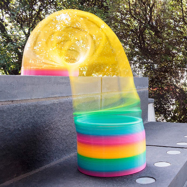 giant rainbow spring traditional spring toy bigger better plastic coil colours colourful colour color colorful colors flexing motion extra large coil rainbow ages 3+ spark joy toy rainbow fun toys pink yellow green popular