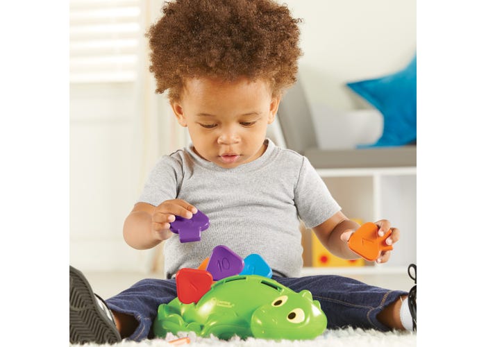 steggy the fine motor dino learning resources prehistoric fine motor skills hand strength pinchable pullable scales grasp fine motor skills color matching number recognition vibrant warm cool colors colorful learning education education ages 2+ baby babies toddlers toddler dino numbers toy toys