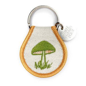 Show your keys some love with one of our patch keychains. Super cute and eye-catching, our double-sided embroidered keychain designs range from flowers and strawberries to sheep and chickens - which makes me think we pretty much got it all covered. Made with high-quality materials for a durable, long-lasting accessory. "Mushroom" Retro Inspired Great gift Your new favorite accessory Embroidered Natural Cotton Patch Keychain Double-Sided Embroidery Metal Split Keyring. 2.5" x 1.5"