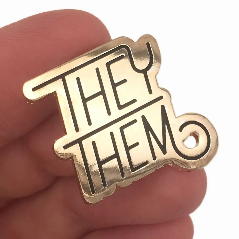 Introduce yourself with these Pronoun Pins! These little pins are perfect for your lapel, bag, or jacket. Pronouns: They/them. This pin has two clasps to keep it in place.