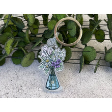 Load image into Gallery viewer, DESCRIPTION   This is an Acrylic keychain of my science flask filled with pink and white flowers painting.  DETAILS  - Keychains come in cellophane bag with card stock backing.  - Keychains are made of a durable and waterproof transparent acrylic - Front of keychain image with white protective backing  
