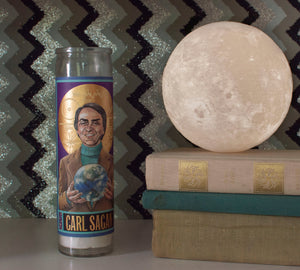 This beautiful votive will show your devotion to St. Carl, patron saint of neighbors, long voyages, calling Home. It's the perfect gift for everyone on your team... or that special person who makes you feel most at home on our pale blue dot