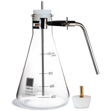 Load image into Gallery viewer,  Hard science meets iconic design. The Laboratory Flask Serving Carafe/Kettle lets you store and pour your libations with scientific flair.  Made from 100% laboratory borosilicate glass certified for use on stove tops and open flame.  Also perfect for storing liqueur, making sun tea, and serving beverages of any kind.  Includes: 1000 ml Borosilicate Flask Laboratory Retort Clamp Handle Food Safe Silicone Plug Stainless Steel Stirring Rod
