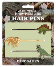 Load image into Gallery viewer, Choose a Dinosaur Look for Your Hair  Stegosaurus plates and spikes: first Mohawk  Triceratops frill or crest: early bouffant  Tyrannosaurus rex: slicked back! shaved clean!
