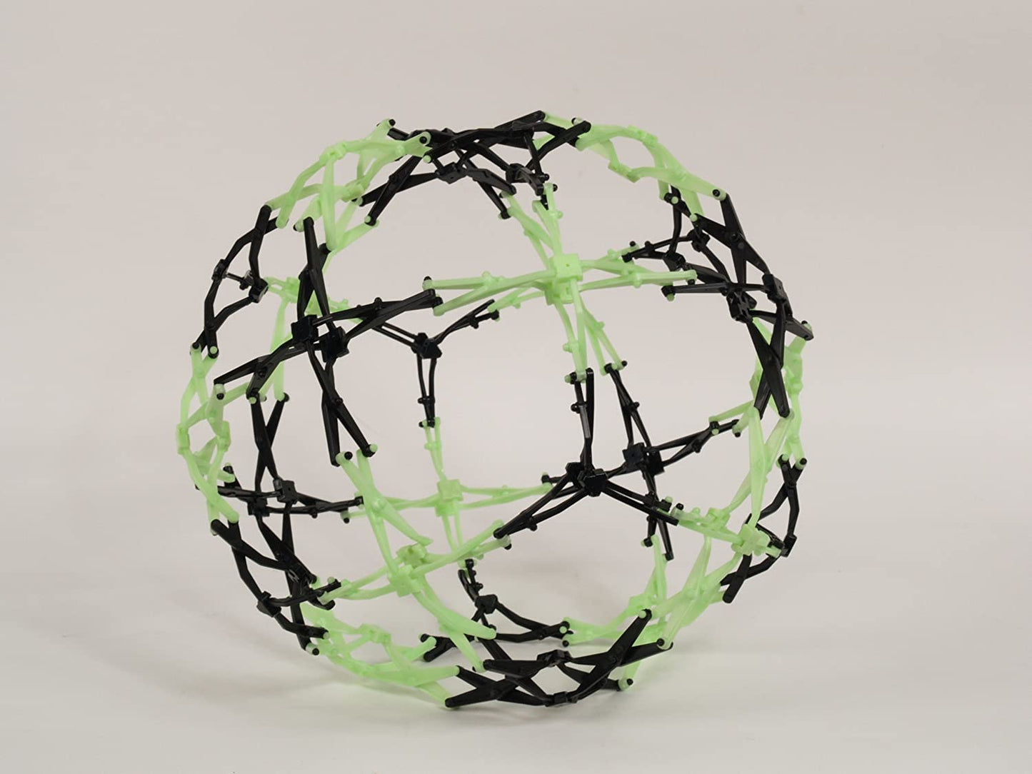 The Hoberman Mini Sphere expands and contracts with a magical motion so fluid and simple. Kids can’t help but play with it for hours. A master of illusion, the sphere can be thrown, bounced, kicked, spun, rolled or suspended from the ceiling.