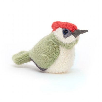 Knock knock! Who's there? It's just Birdling Woodpecker, hunting yummy bugs! Dandy and dashing in moss-green and cream, with a sleek grey beak and scarlet topknot, this woodpecker loves to make a grand entrance.